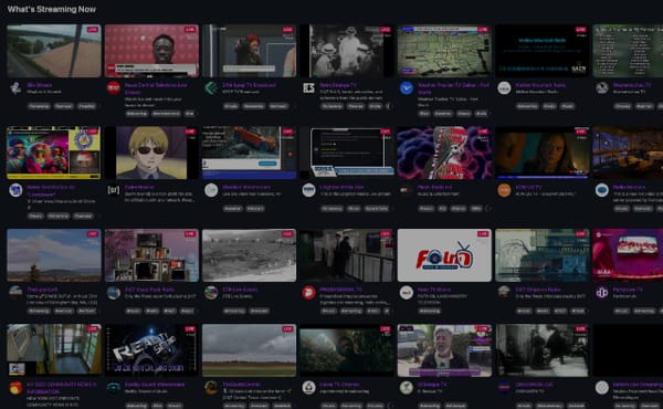 Grid of live streaming thumbnails showing various games and content on a dark streaming platform interface